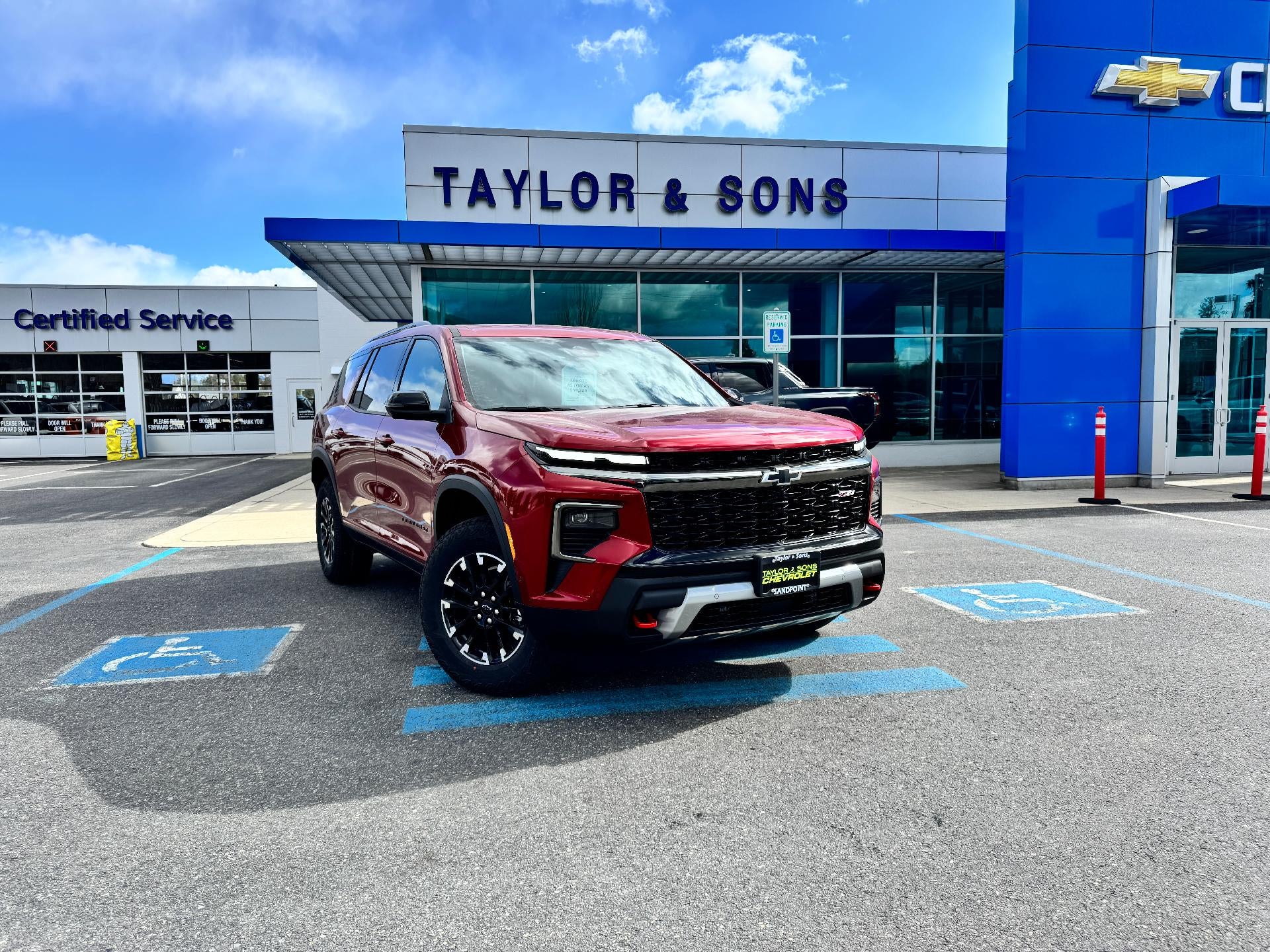 2026 Chevrolet Traverse Z71 OFF ROAD / SUPER CRUISE / SURROUND VISION / BOSE AUDIO in Radiant Red Tintcoat — front three-quarter view