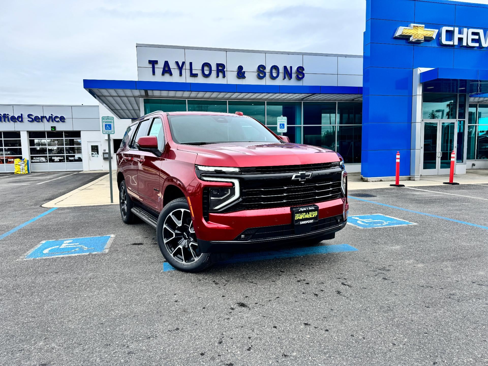 2026 Chevrolet Tahoe RST / 5.3 LITER V8 / PANO SUNROOF / SURROUND VISION / ADAPTIVE CRUISE in Radiant Red Tintcoat — front three-quarter...