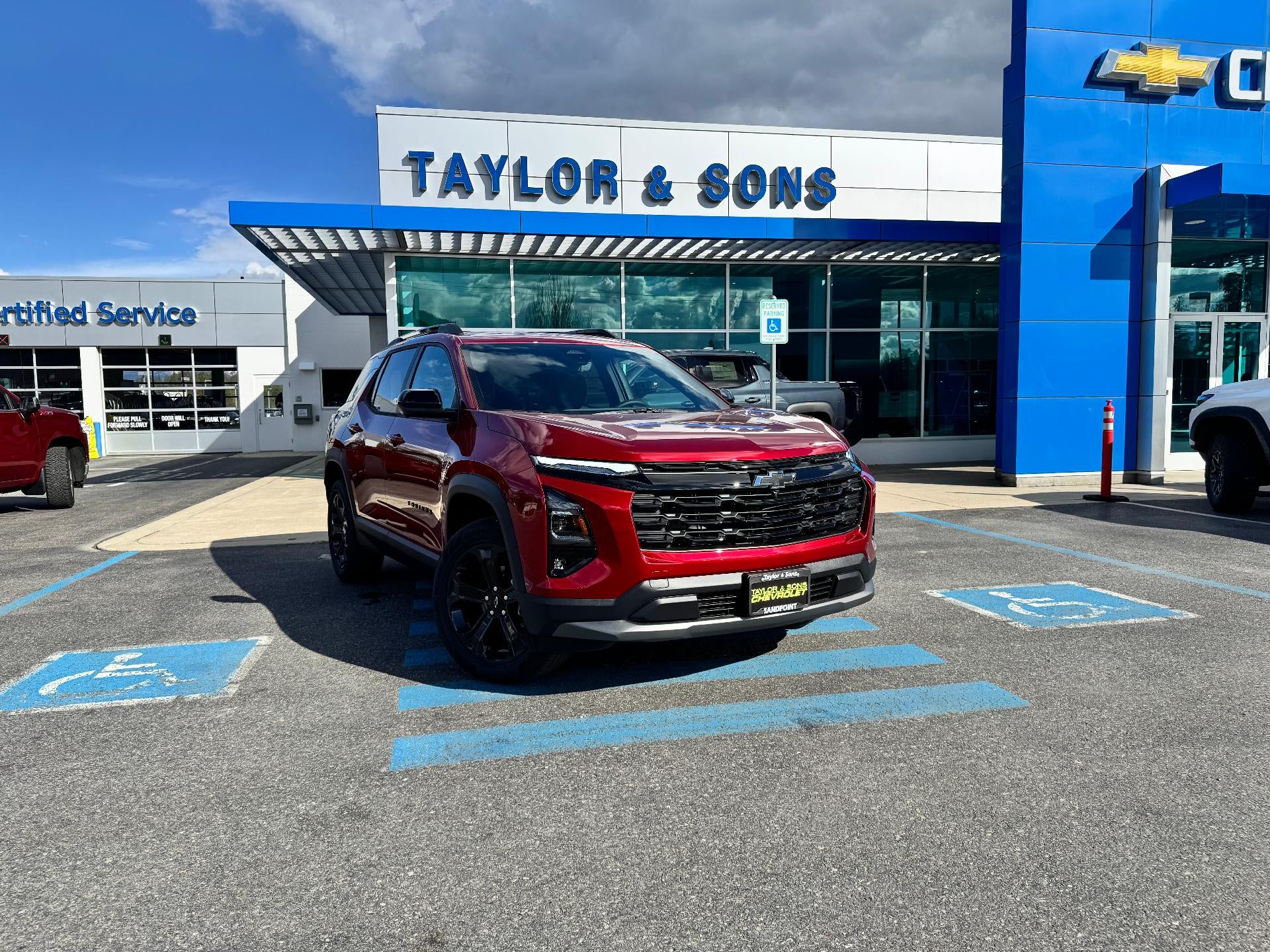 2026 Chevrolet Equinox LT / AWD / MIDNIGHT PCKG / SURROUND VISION / ADAPTIVE CRUISE in Radiant Red Tintcoat — front three-quarter view