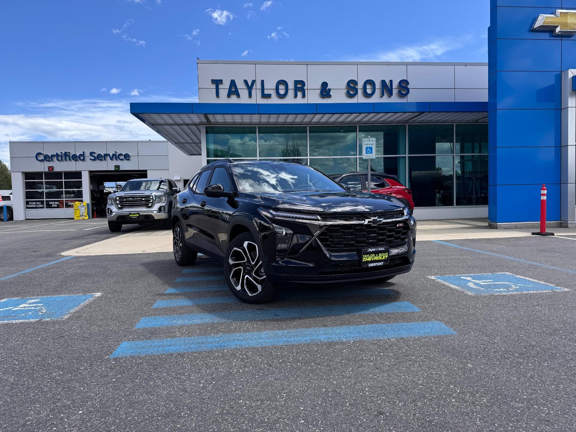 2026 Chevrolet Trax 2RS / 1.2 TURBO / HEATED SEATS / SAFETY PCKG / ADAPTIVE CRUISE in Mosaic Black Metallic — front three-quarter view