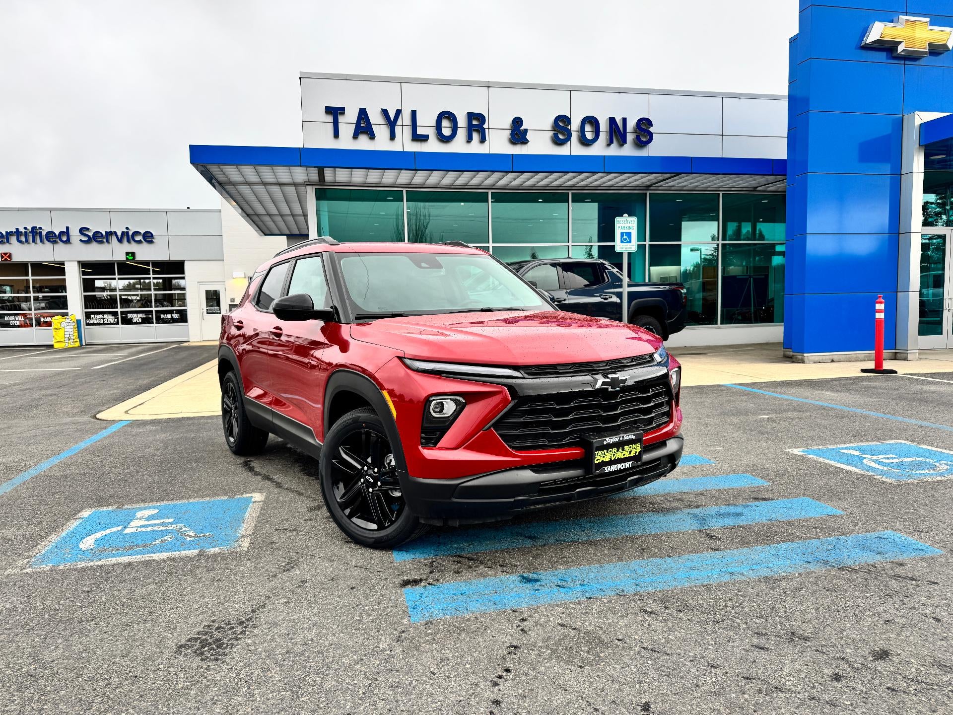 2026 Chevrolet Trailblazer LT / AWD / 1.3 TURBO / MIDNIGHT PCKG / HEATED SEATS / ADAPTIVE CRUISE in Apex Red — front three-quarter view